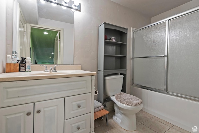 1288 S Pondside Dr, Saratoga Springs, UT 84045 - full bath with toilet, tile patterned floors, vanity, and shower / bath combination with glass door