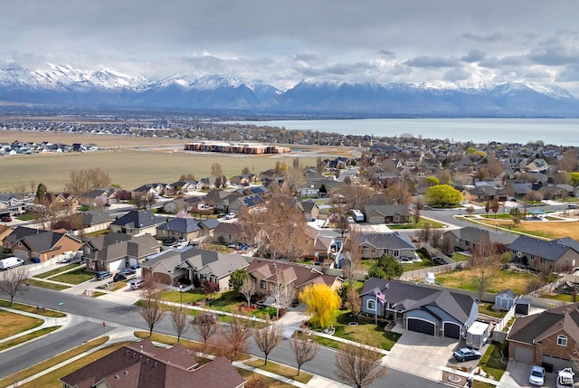 1288 S Pondside Dr, Saratoga Springs, UT 84045 - drone / aerial view featuring a water and mountain view and a residential view