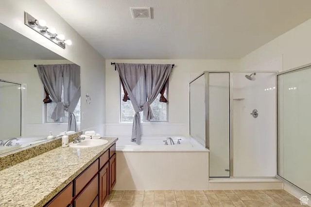 1784 W Grays Pl, Lehi, UT 84043 - full bath featuring vanity, a shower stall, a garden tub, and visible vents