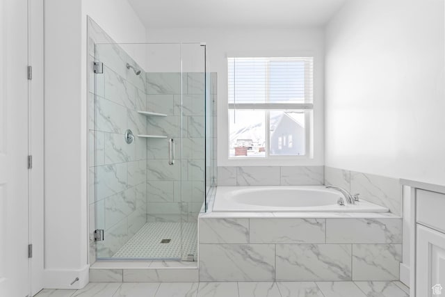 2351 W 2950 N Unit 104, Farr West, UT 84404 - bathroom featuring marble finish floor, a garden tub, and a shower stall
