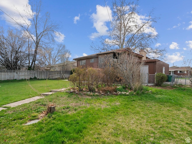 view of yard with fence