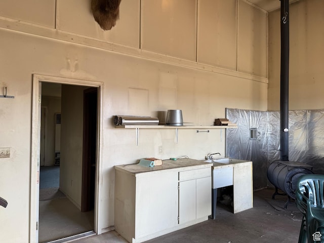 6051 N 11500 E, Lapoint, UT 84039 - interior space featuring white cabinetry and concrete floors