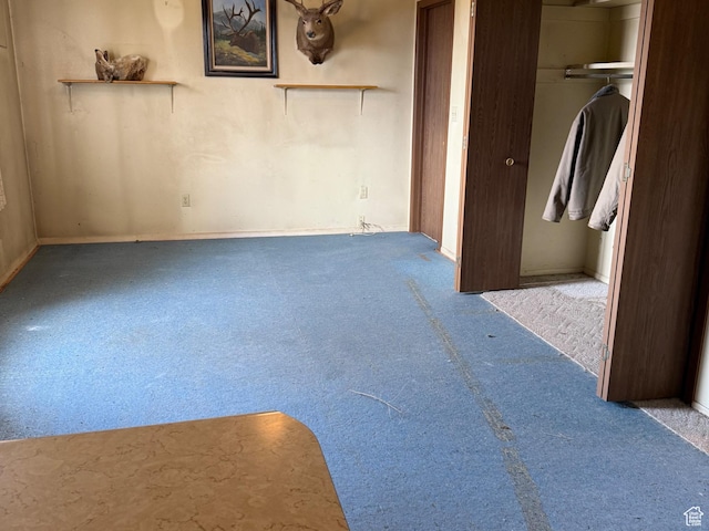 6051 N 11500 E, Lapoint, UT 84039 - unfurnished bedroom featuring carpet flooring and a closet