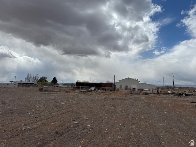 6051 N 11500 E, Lapoint, UT 84039 - view of yard with an outbuilding and fence