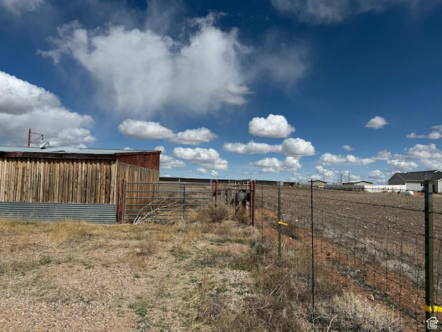 6051 N 11500 E, Lapoint, UT 84039 - view of yard featuring fence and an outdoor structure