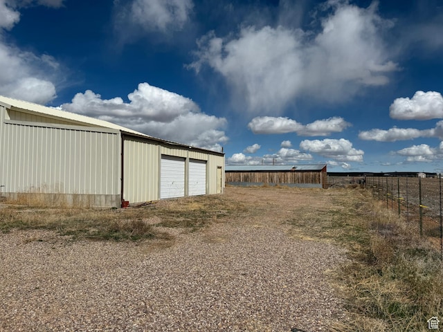 6051 N 11500 E, Lapoint, UT 84039 - detached garage featuring fence