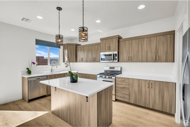 3150 Fuchsia Dr, St George, UT 84790 - kitchen featuring stainless steel appliances, recessed lighting, and a kitchen island