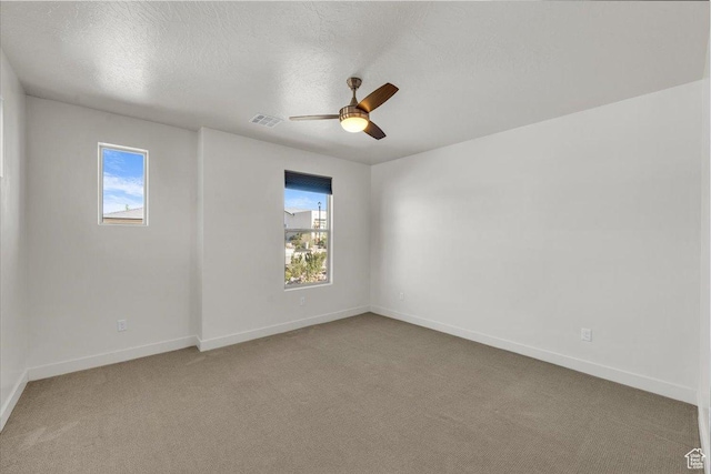3150 Fuchsia Dr, St George, UT 84790 - empty room featuring visible vents, ceiling fan, carpet floors, and baseboards