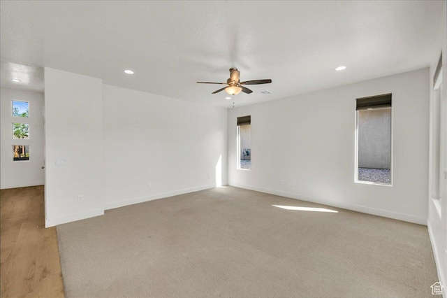3150 Fuchsia Dr, St George, UT 84790 - spare room with light carpet, ceiling fan, baseboards, and recessed lighting