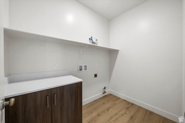 3150 Fuchsia Dr, St George, UT 84790 - washroom featuring laundry area, hookup for a washing machine, electric dryer hookup, light wood finished floors, and baseboards