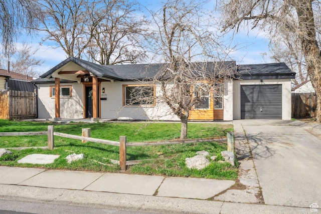 4970 S 4720 W, Salt Lake City, UT 84118 - single story home featuring a front lawn, fence, driveway, and a garage