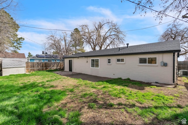 4970 S 4720 W, Salt Lake City, UT 84118 - back of property with a patio area, a lawn, cooling unit, and fence