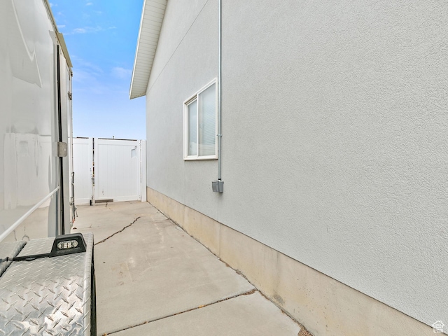 view of side of home featuring a patio