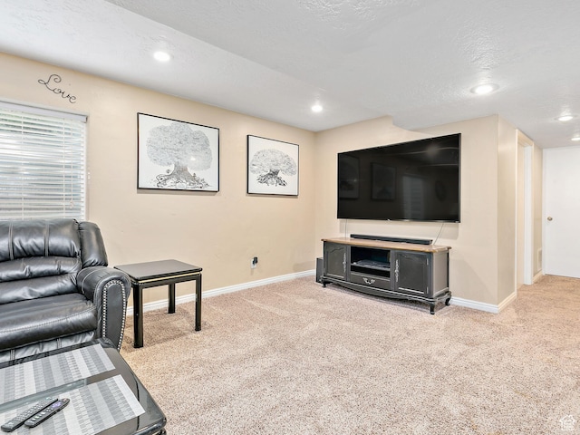 living room featuring baseboards, recessed lighting, and light carpet