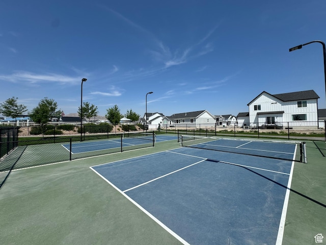 3440 W Mitchell Dr, Lehi, UT 84043 - view of tennis court featuring a residential view and fence