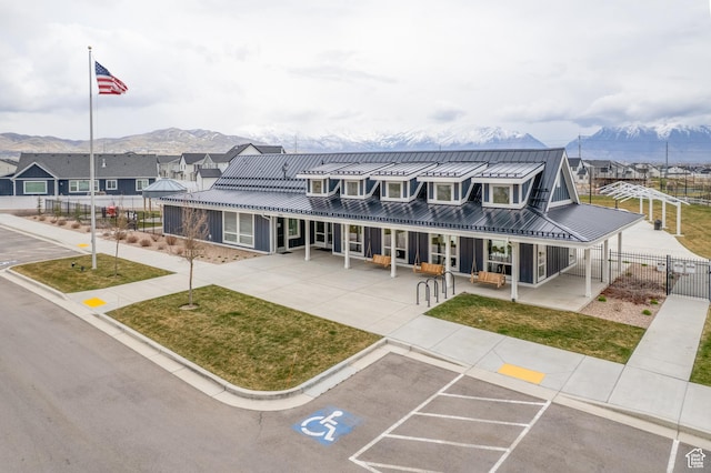 3440 W Mitchell Dr, Lehi, UT 84043 - view of building exterior with a residential view, a mountain view, and fence