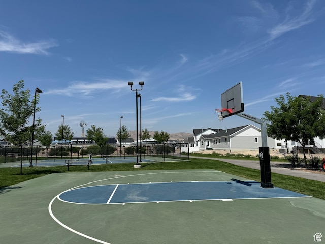 3440 W Mitchell Dr, Lehi, UT 84043 - view of basketball court featuring a residential view, a tennis court, fence, and community basketball court