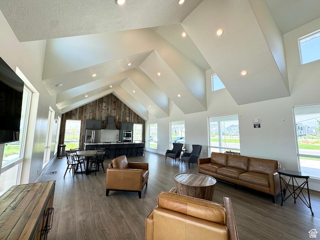 3440 W Mitchell Dr, Lehi, UT 84043 - living area featuring baseboards, high vaulted ceiling, recessed lighting, and dark wood-style flooring