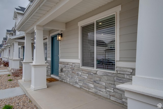 3440 W Mitchell Dr, Lehi, UT 84043 - entrance to property featuring covered porch and stone siding