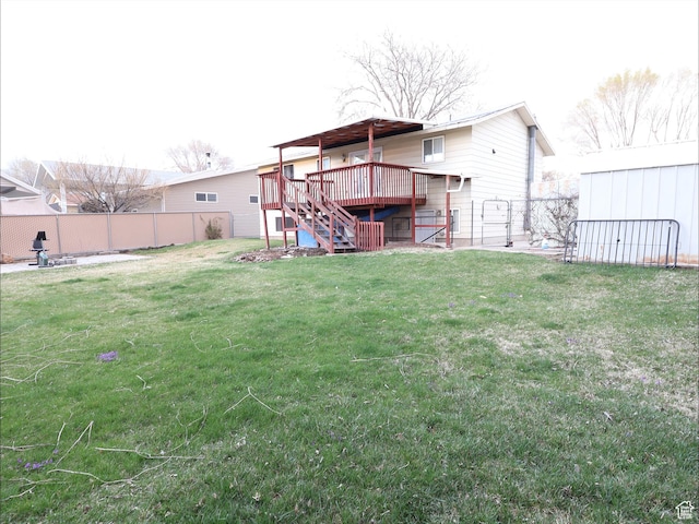 view of yard featuring a deck and stairway