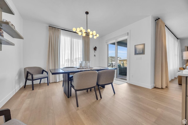 2119 N 520 W, Centerville, UT 84014 - dining area featuring an inviting chandelier, light wood finished floors, and baseboards
