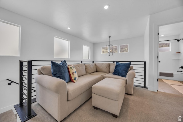 2119 N 520 W, Centerville, UT 84014 - living room with recessed lighting, baseboards, carpet floors, and a notable chandelier