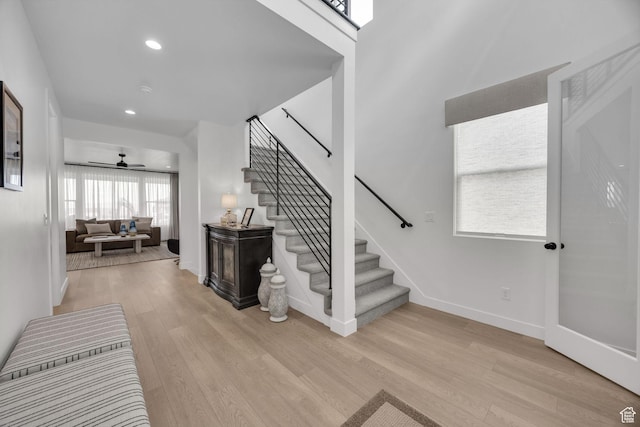 2119 N 520 W, Centerville, UT 84014 - entryway featuring light wood finished floors, a ceiling fan, baseboards, recessed lighting, and stairway