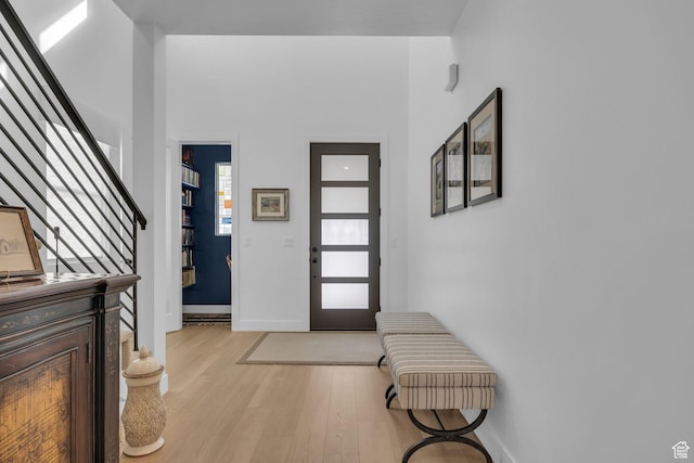2119 N 520 W, Centerville, UT 84014 - entrance foyer with baseboards, light wood-style flooring, and stairway