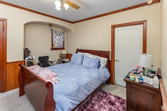 67 N 200 E, Tremonton, UT 84337 - bedroom with wooden walls, arched walkways, ornamental molding, and carpet