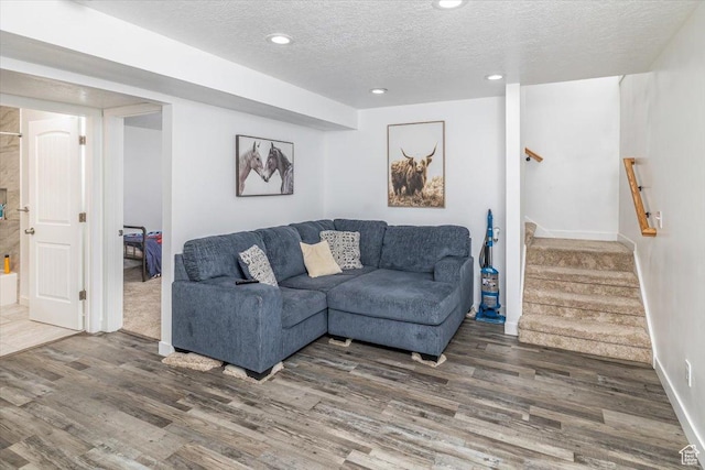 67 N 200 E, Tremonton, UT 84337 - living room with recessed lighting, a textured ceiling, wood finished floors, and stairway