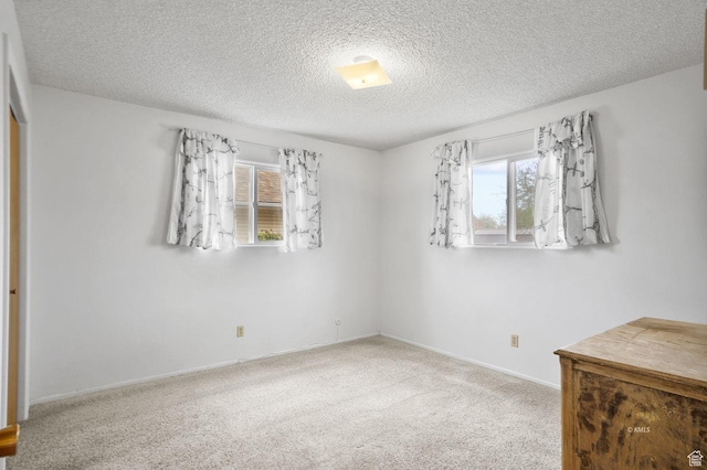 67 W 300 S, Kanab, UT 84741 - carpeted empty room featuring baseboards and a textured ceiling