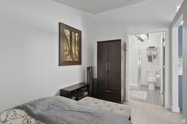 67 W 300 S, Kanab, UT 84741 - bedroom featuring light tile patterned flooring and ensuite bath