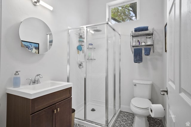 67 W 300 S, Kanab, UT 84741 - bathroom featuring toilet, vanity, and a stall shower