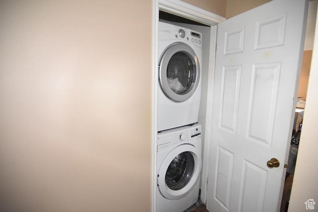 949 N University Ave Unit 19, Provo, UT 84604 - washroom with stacked washer and dryer and laundry area