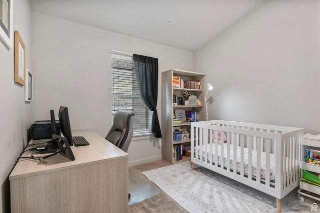 carpeted bedroom with baseboards