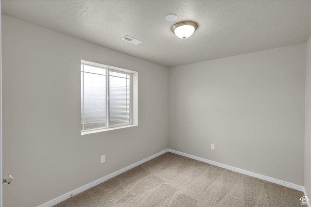 2367 N Monarch Cir E, Cedar City, UT 84721 - empty room featuring baseboards, carpet floors, and a textured ceiling