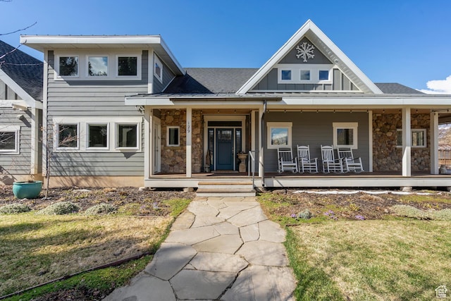 129 S 7200 E, Huntsville, UT 84317 - view of front of property featuring roof with shingles, board and batten siding, covered porch, and stone siding