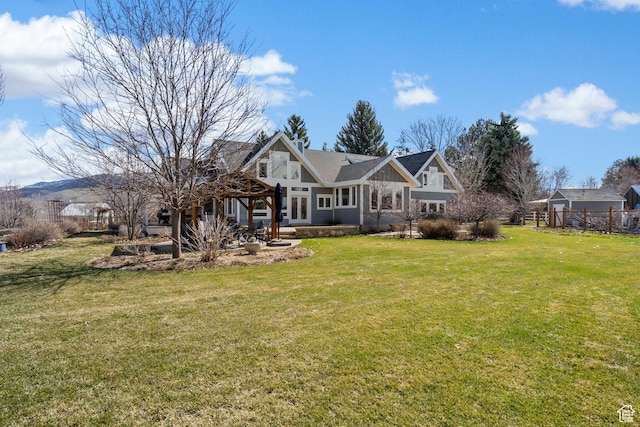 129 S 7200 E, Huntsville, UT 84317 - rear view of property with fence and a lawn