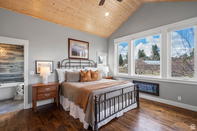 129 S 7200 E, Huntsville, UT 84317 - bedroom with baseboards, dark wood-type flooring, multiple windows, and vaulted ceiling