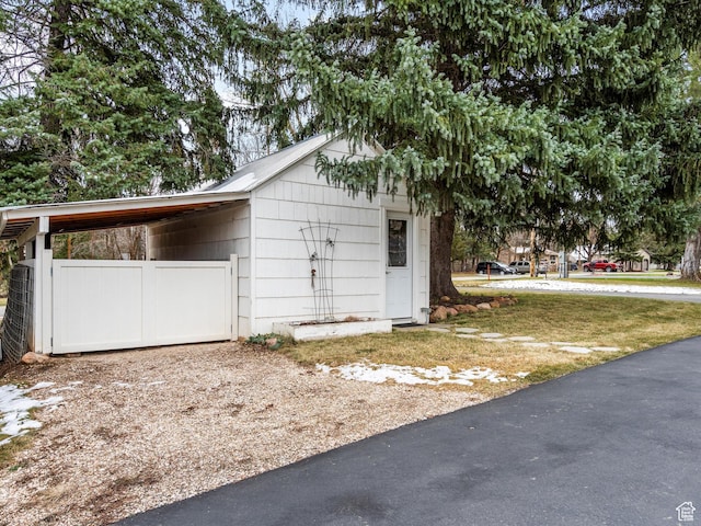 129 S 7200 E, Huntsville, UT 84317 - garage featuring an attached carport and driveway