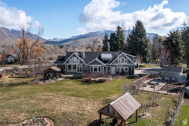 129 S 7200 E, Huntsville, UT 84317 - back of property featuring a lawn, a patio, fence, a gazebo, and a mountain view