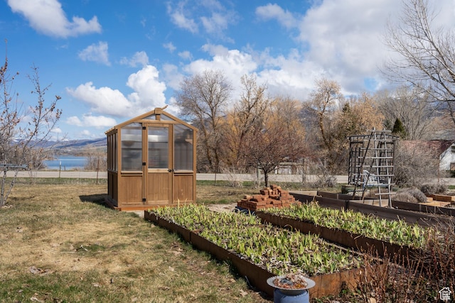 129 S 7200 E, Huntsville, UT 84317 - view of yard featuring a garden, a greenhouse, and an outdoor structure