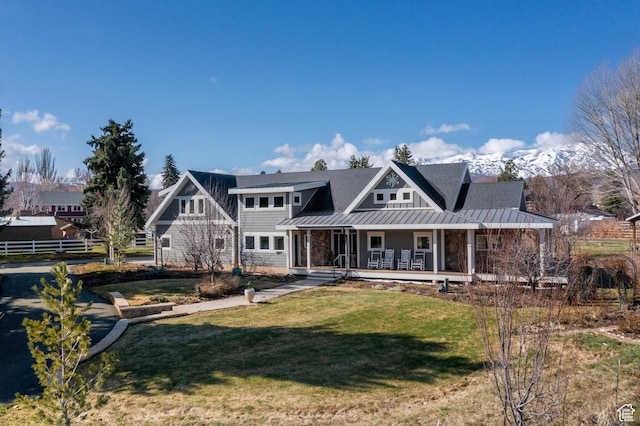 129 S 7200 E, Huntsville, UT 84317 - view of front of property with a standing seam roof, covered porch, metal roof, a front yard, and fence