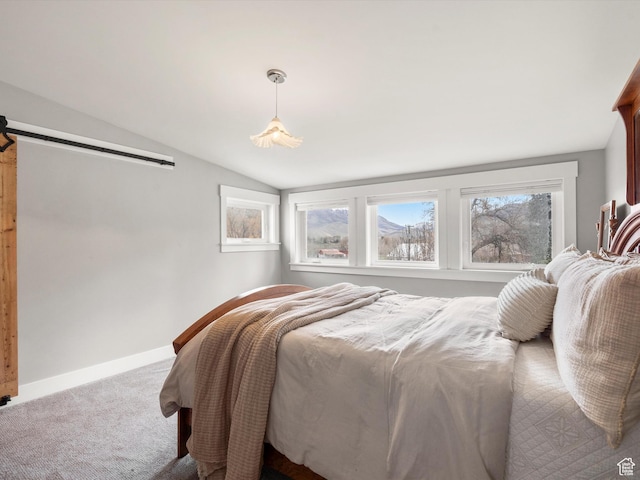 129 S 7200 E, Huntsville, UT 84317 - bedroom featuring baseboards, carpet flooring, a barn door, and vaulted ceiling