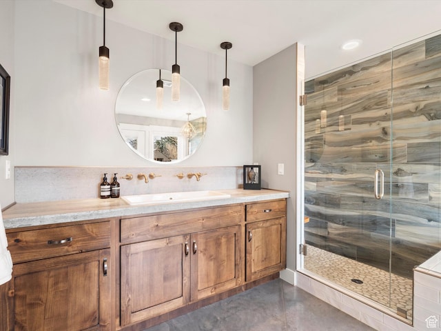 129 S 7200 E, Huntsville, UT 84317 - full bath featuring tasteful backsplash, a shower stall, vanity, and finished concrete flooring