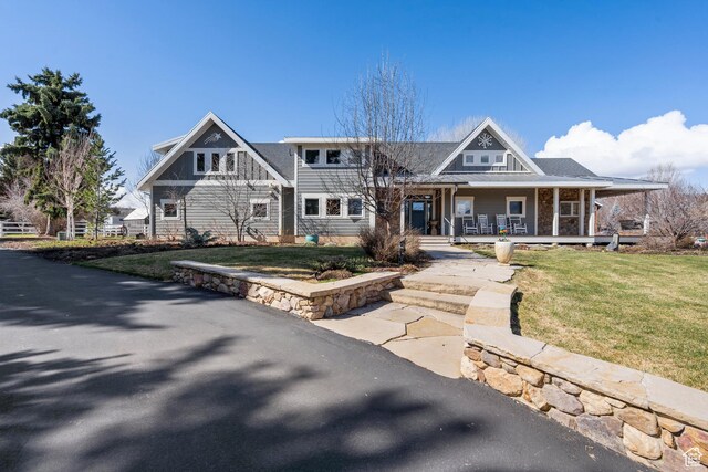 129 S 7200 E, Huntsville, UT 84317 - view of front of house with a porch and a front yard