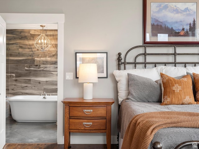 129 S 7200 E, Huntsville, UT 84317 - bedroom featuring a chandelier and finished concrete flooring