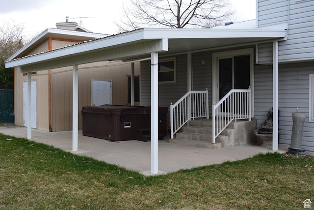 567 S Hazel Dr, Salem, UT 84653 - back of property with a hot tub, a patio, and a lawn
