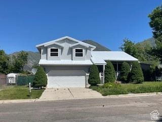 567 S Hazel Dr, Salem, UT 84653 - view of front of property featuring an attached garage and concrete driveway