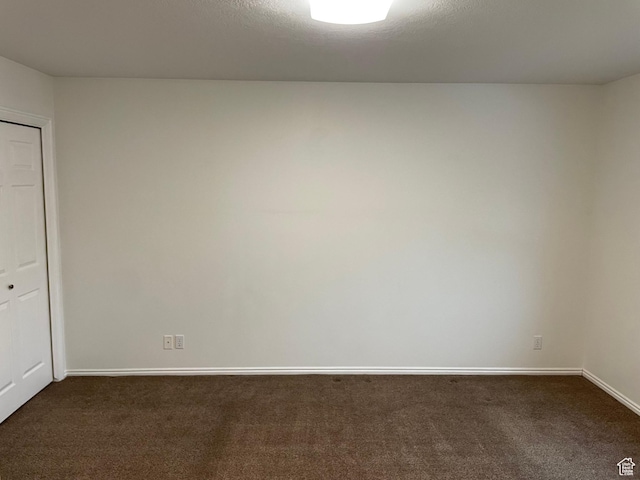 567 S Hazel Dr, Salem, UT 84653 - spare room featuring dark colored carpet and baseboards